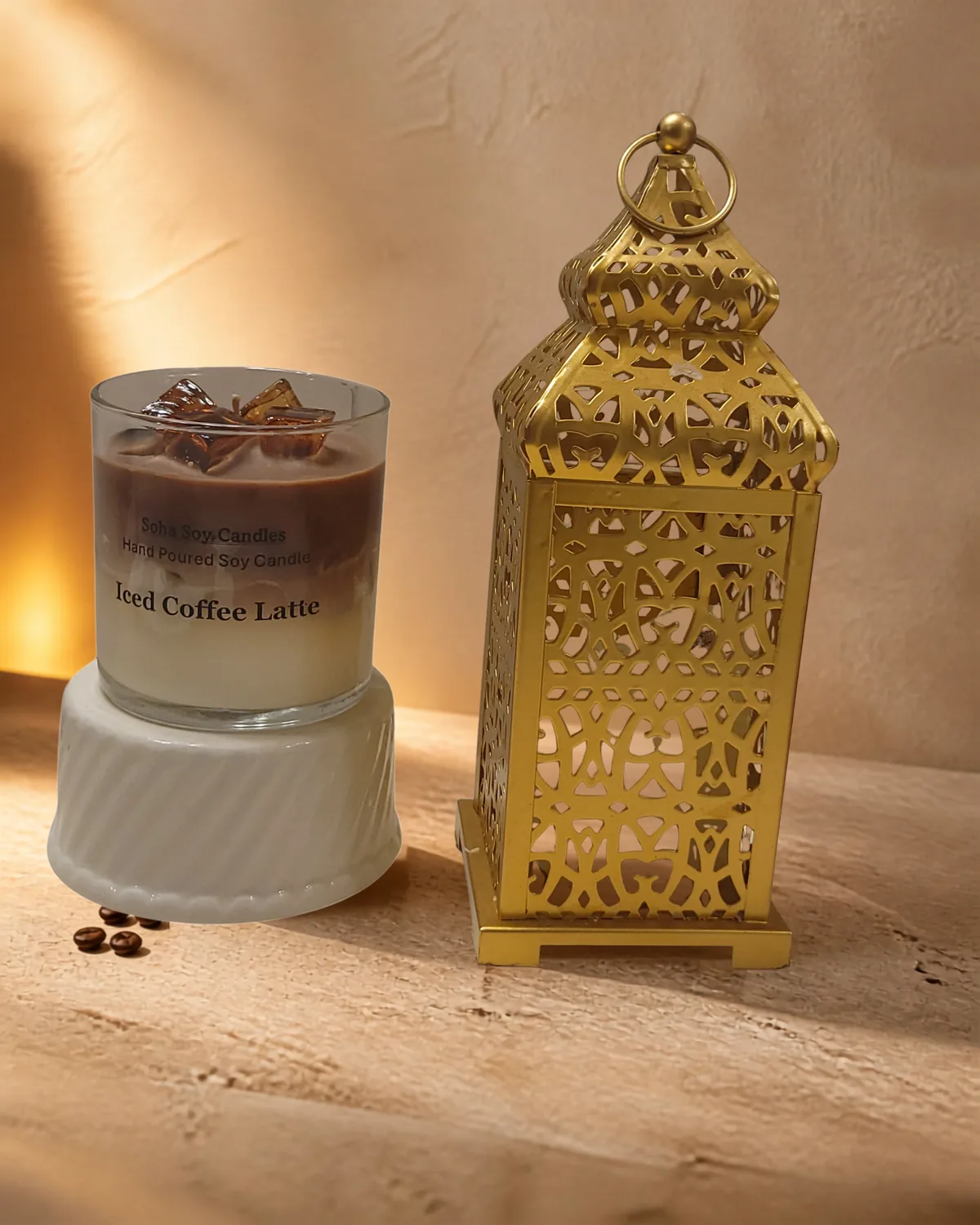 Iced Coffee Latte candle displayed beside a decorative gold lantern