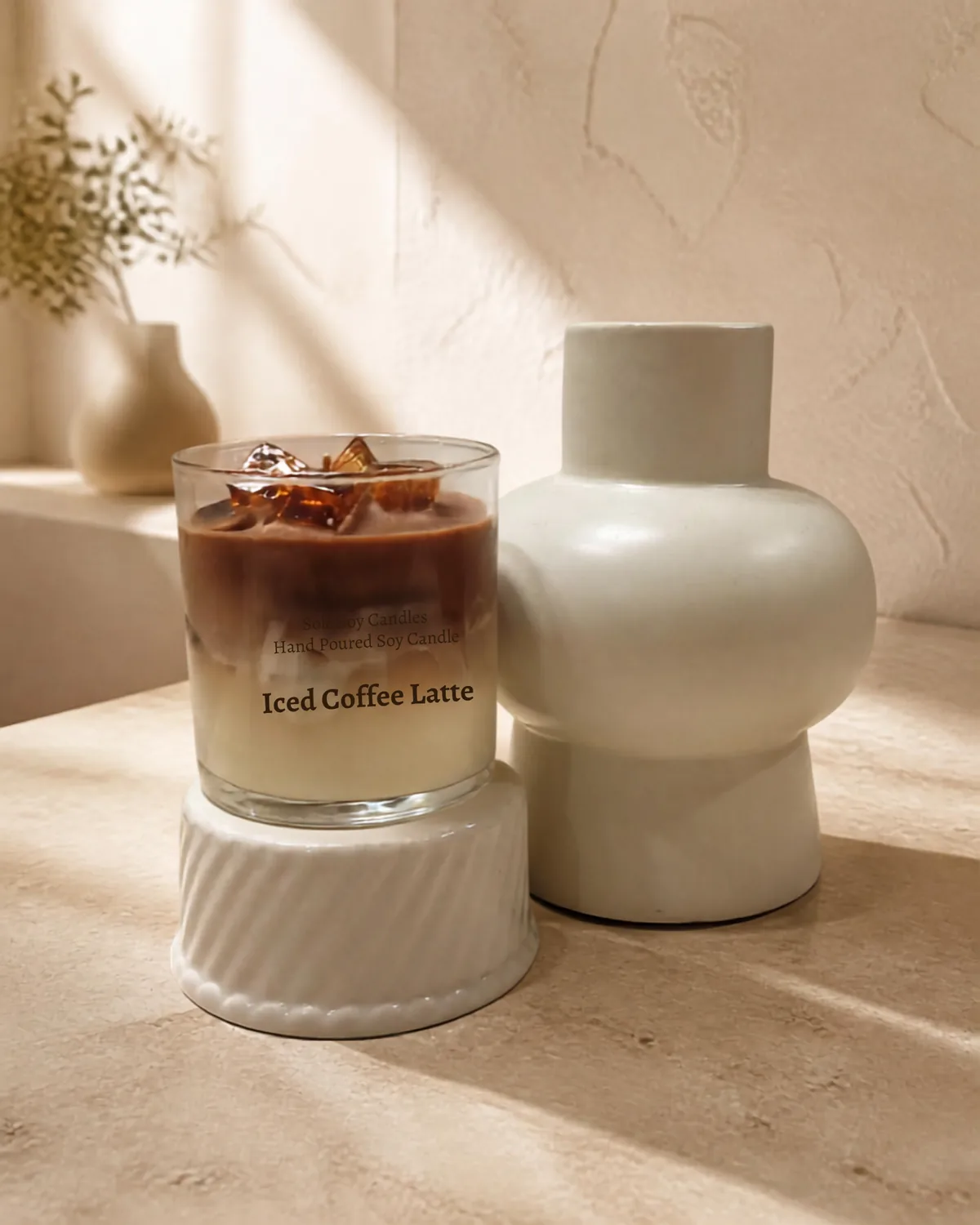 Iced Coffee Latte soy candle styled with neutral home decor