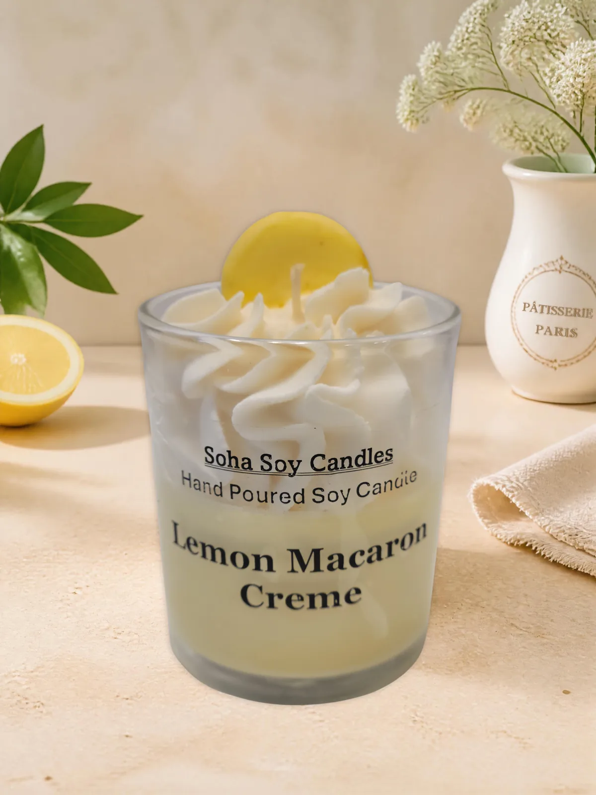 Lemon Macaron Creme soy candle with piped white wax and yellow macaron topper
