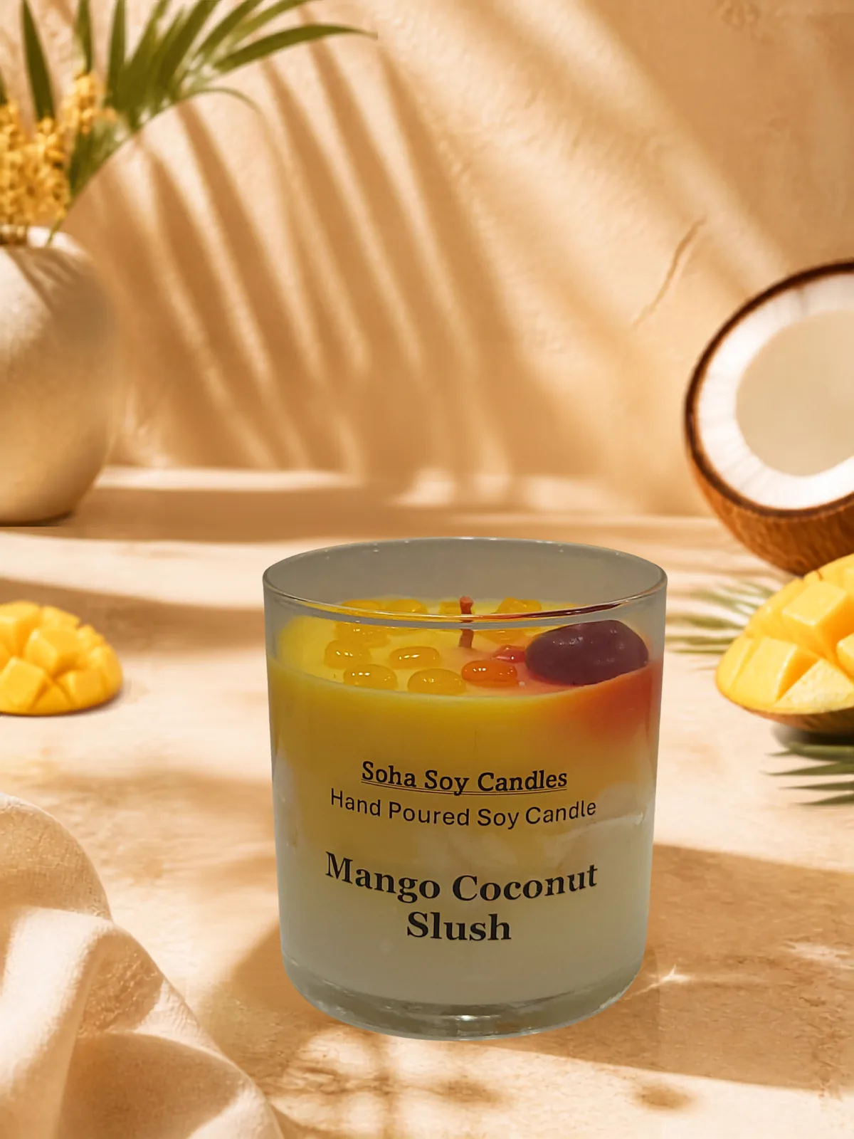 Mango Coconut Slush soy candle in a bright tropical setting