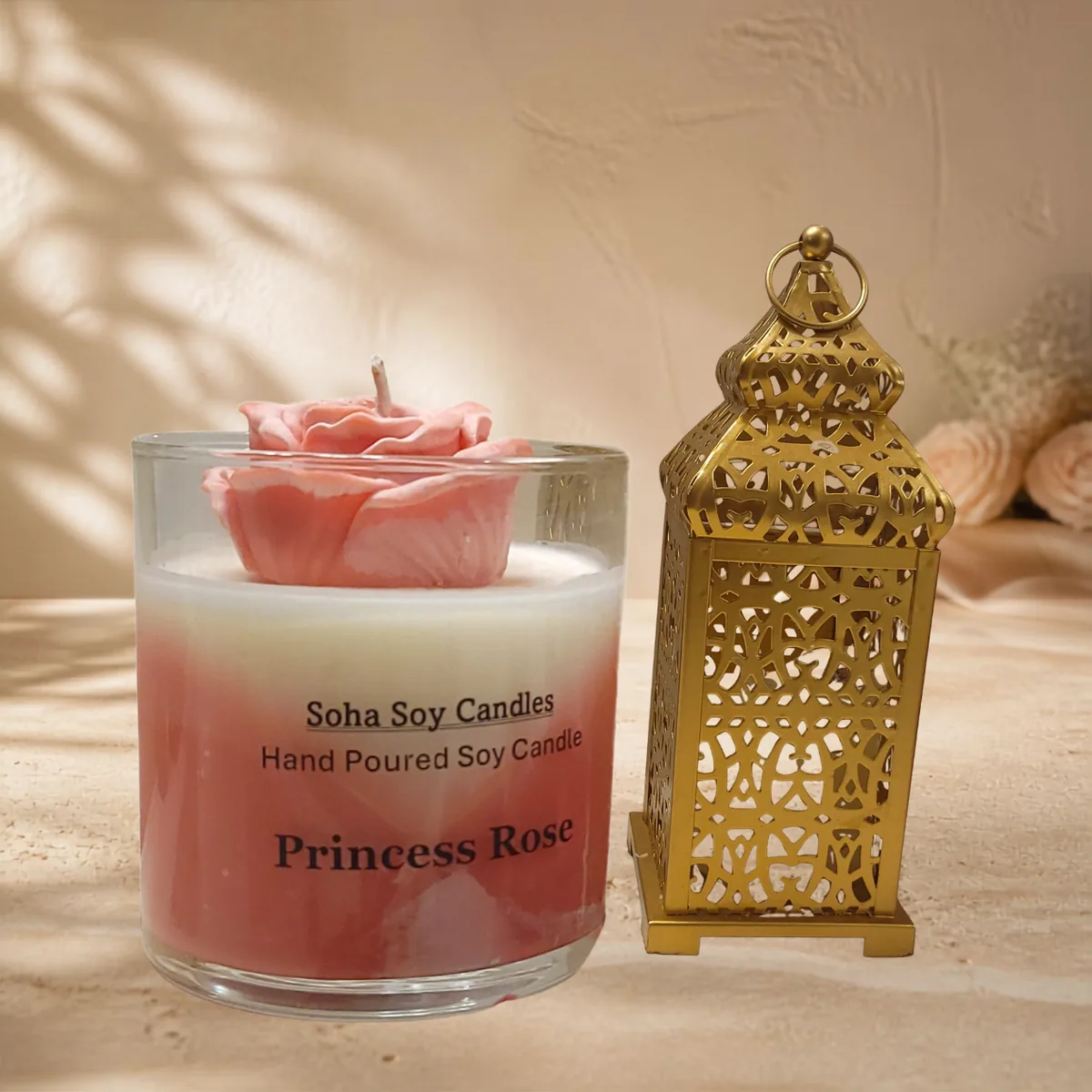 Princess Rose candle displayed beside a decorative gold lantern