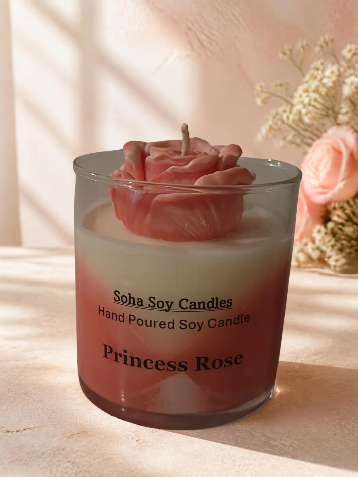 Princess Rose scented soy candle with a sculpted pink wax rose topper