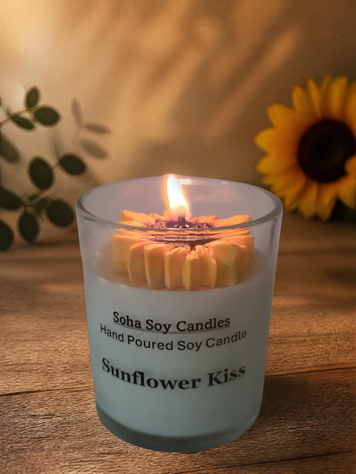 Sunflower Kiss burning candle in a warm sunflower-themed lifestyle setting